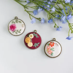 embroidered floral pendants