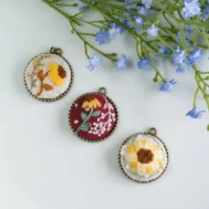 sunflower embroidered pendants
