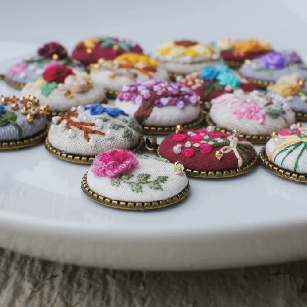 embroidered pendants