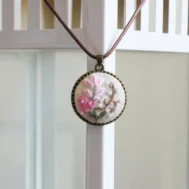 embroidered pink floral pendant