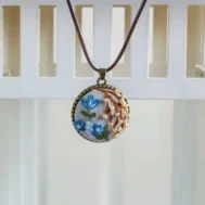 beaded embroidered floral pendant