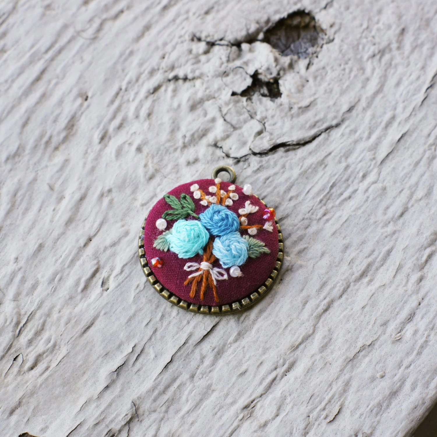 embroidered bouquet floral pendant