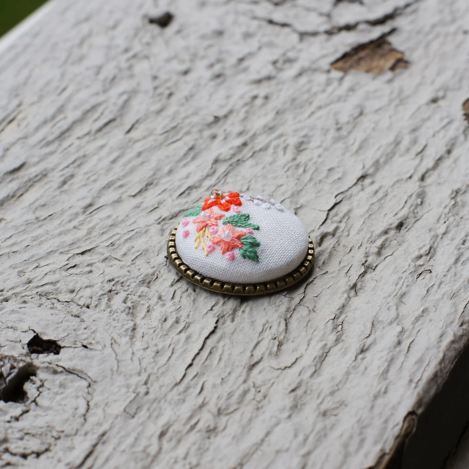 embroidered floral pendants