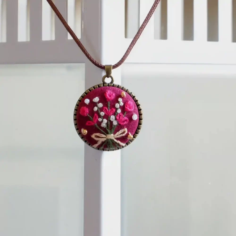 embroidered bouquet floral pendant