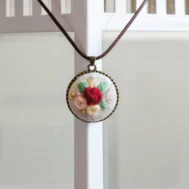 embroidered rose floral pendant