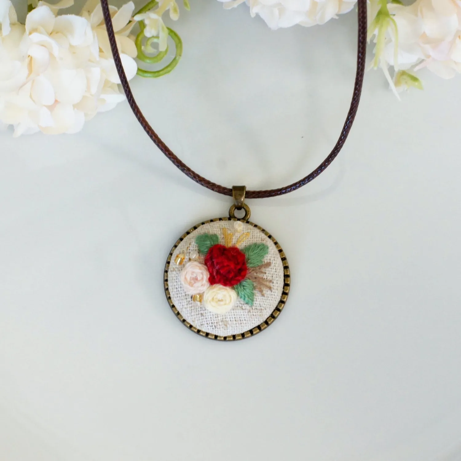embroidered rose floral pendant