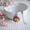 embroidered pendant