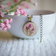 embroidered pendant