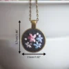 embroidered pendant