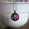 embroidered pendant