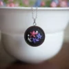 embroidered pendant