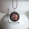 embroidered pendant