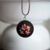 embroidered pendant