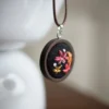 embroidered pendant