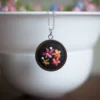 embroidered pendant