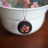 embroidered pendant