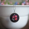 embroidered pendant