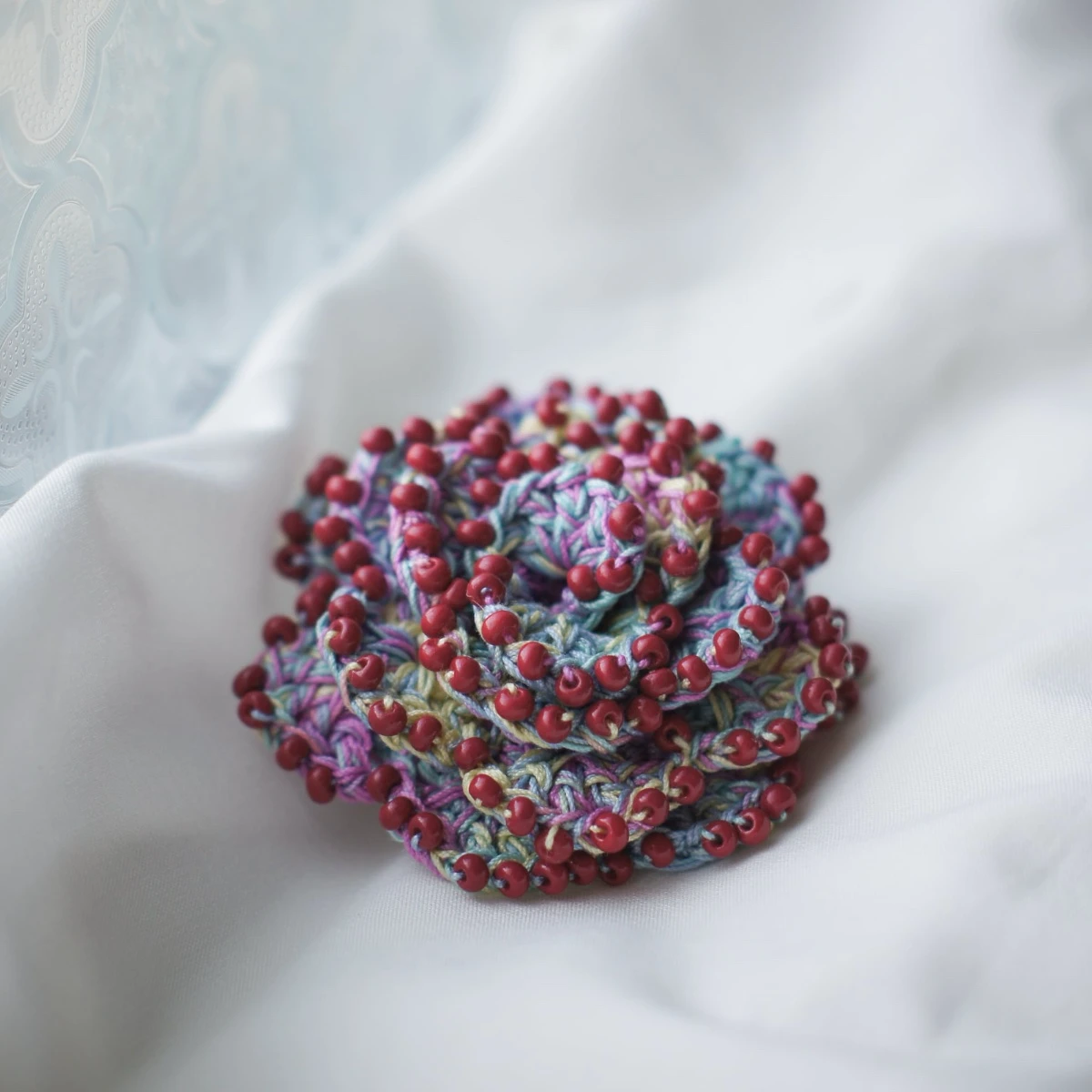 crochet beaded rose brooch