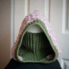 Jasmine wheat knit balaclava hood opening with dusty rose edge, interior view showing construction