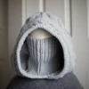 Handmade knitted balaclava in light grey with cable details and wheat stitch edging