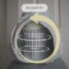 Handmade knitted balaclava in light grey with cable details and wheat stitch edging, with measurements