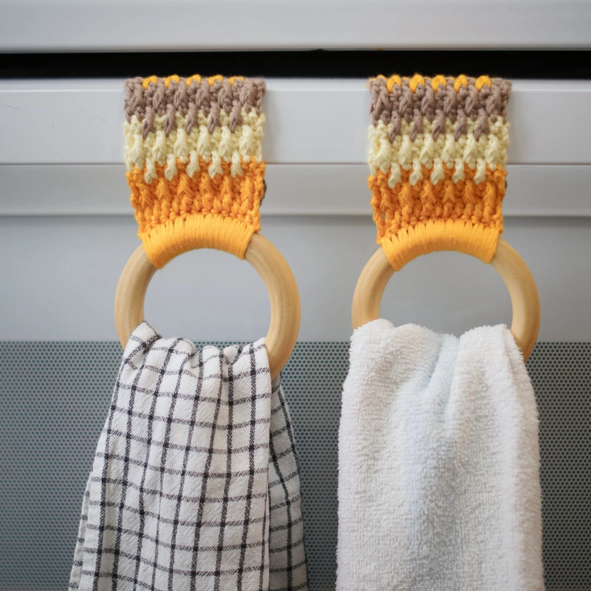 Crochet kitchen towel holders pair - yellow and tan with wooden rings