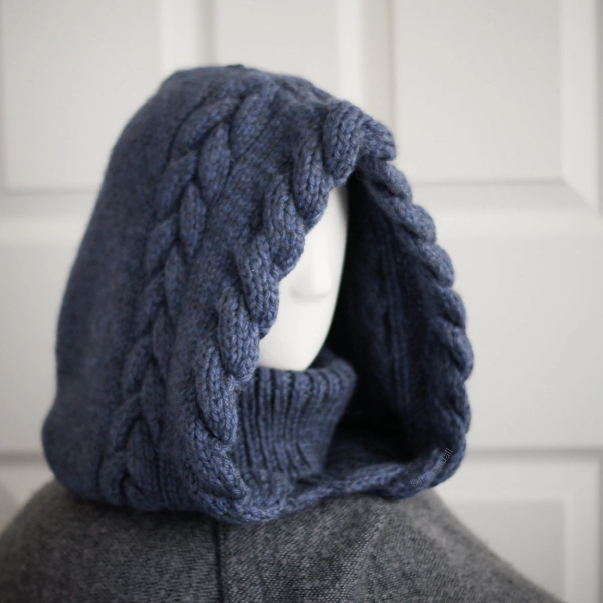 Side view of blue merino balaclava hood showing cozy fit