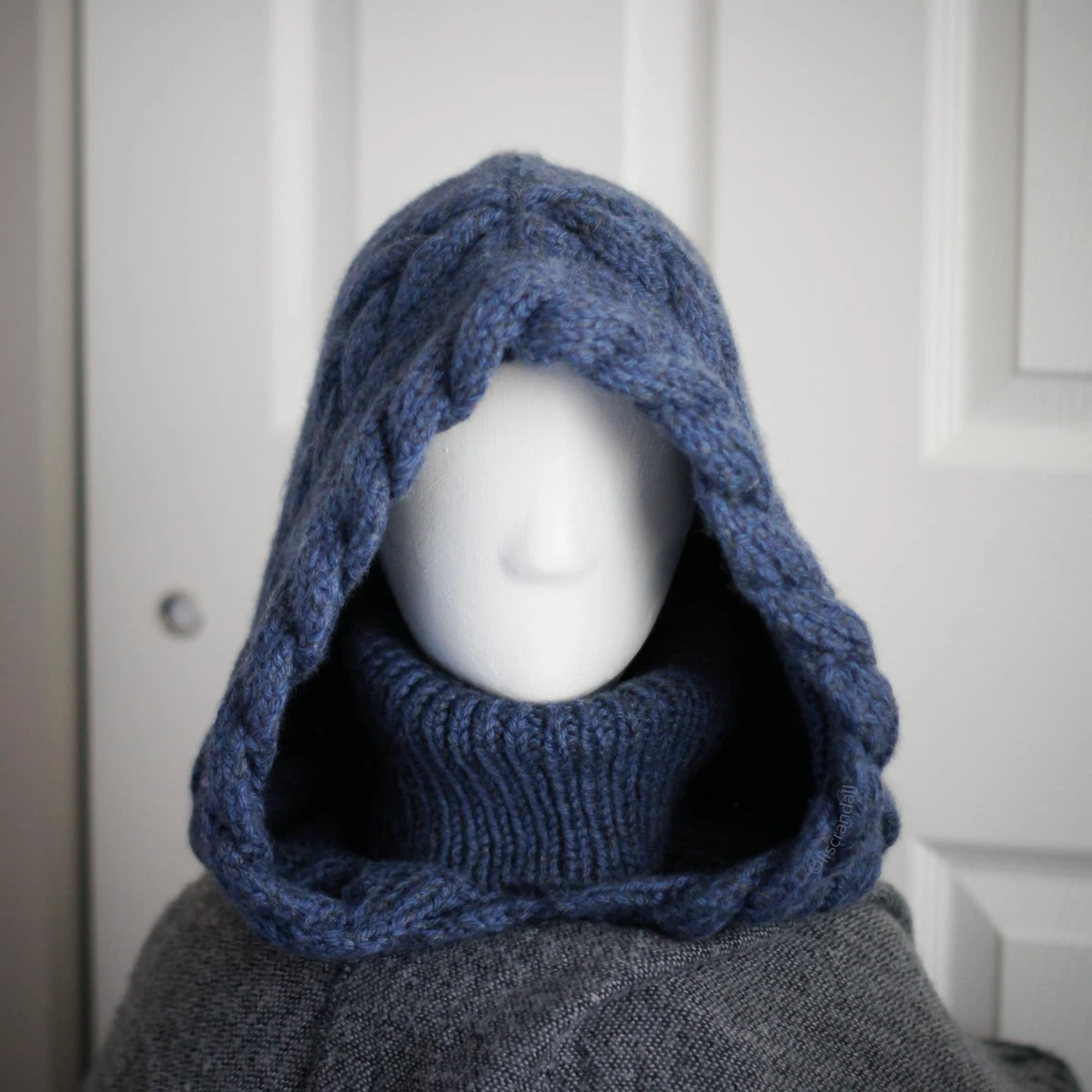 Blue merino balaclava styled for winter warmth, full hood and neck coverage