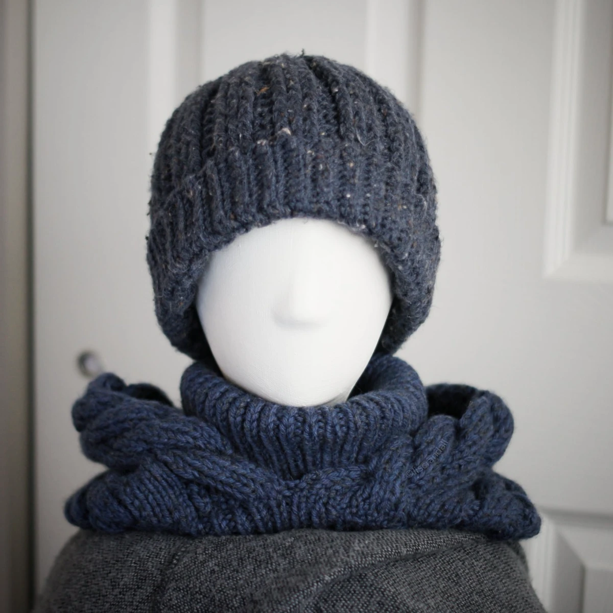 Blue merino balaclava styled for winter warmth, full hood and neck coverage