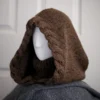 Side view of brown merino balaclava hood showing cozy fit