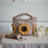 crochet mini bag in khaki color formed with 3D sunflower granny squares. Comes with adjustable strap.