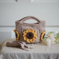 crochet mini bag in khaki color formed with 3D sunflower granny squares. Comes with adjustable strap.