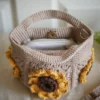 Inside view of crochet mini bag in khaki color formed with 3D sunflower granny squares. Comes with adjustable strap.