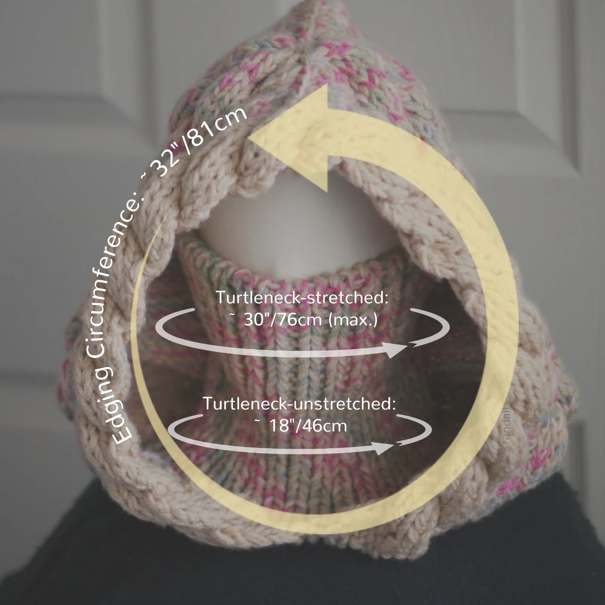 Oatmeal sprinkles knit balaclava hood with twist edging and folded turtleneck worn by mannequin, showing the measurement