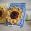 crochet sunflower squeeze pouch in blue, side view