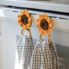 crochet sunflower kitchen towel holder with wood rings