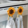 crochet sunflower kitchen towel holder with wood rings