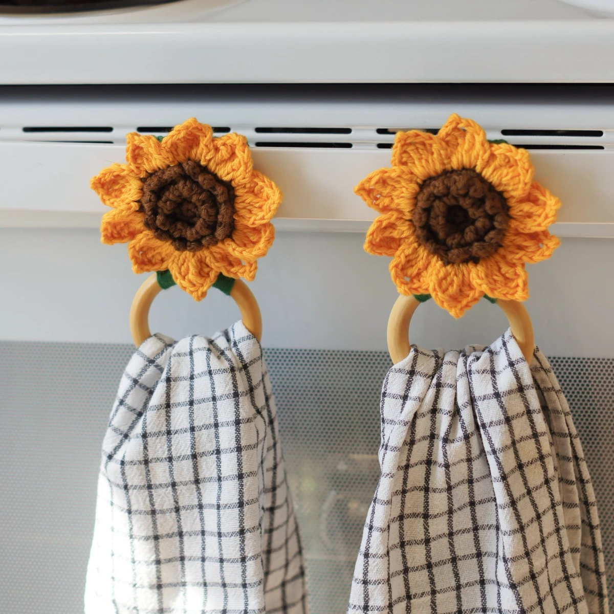 crochet sunflower kitchen towel holder with wood rings
