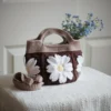crochet daisy bag in chocolate and khaki color formed with 3D daisy granny squares. Comes with adjustable strap.