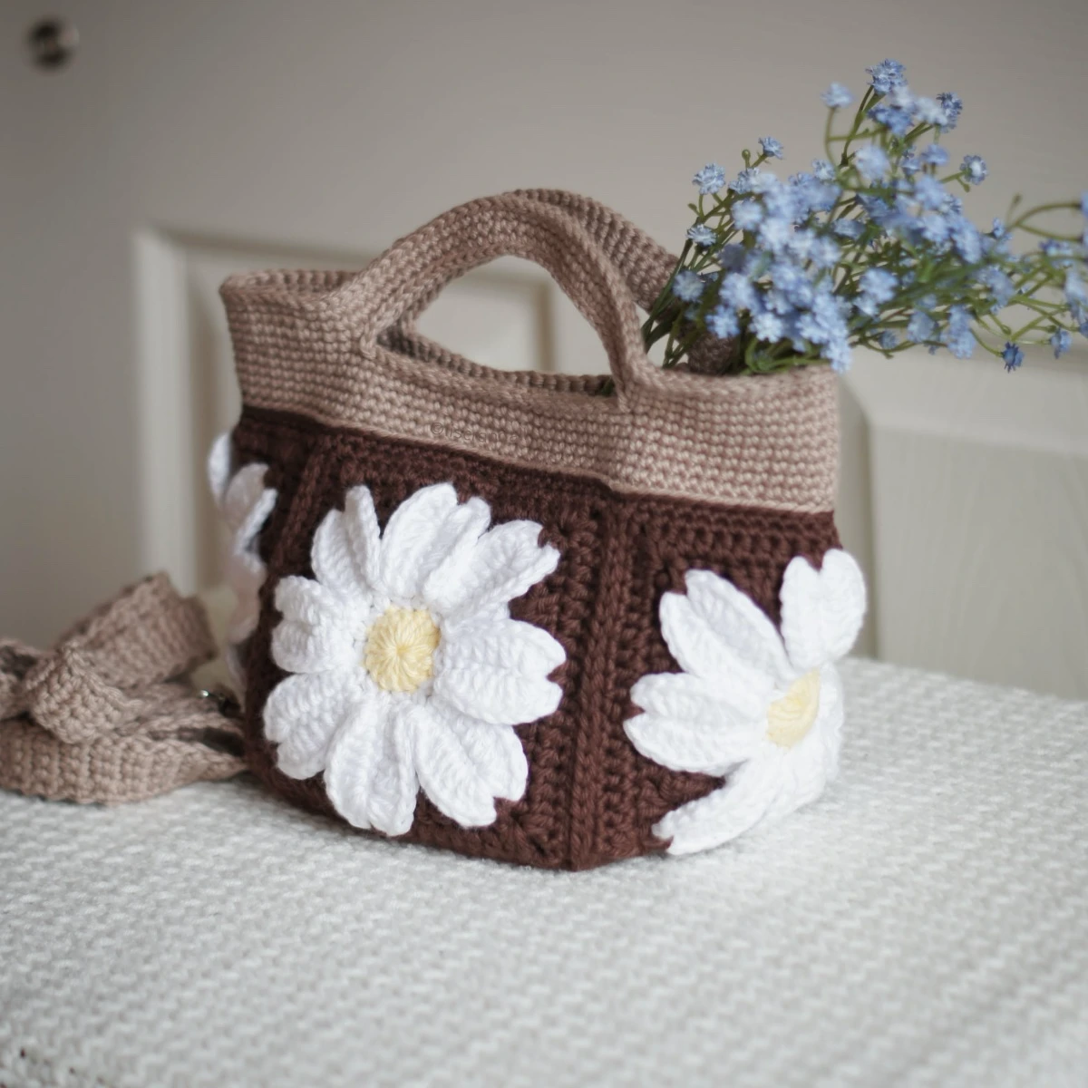 crochet daisy bag in chocolate and khaki color formed with 3D daisy granny squares. Comes with adjustable strap.
