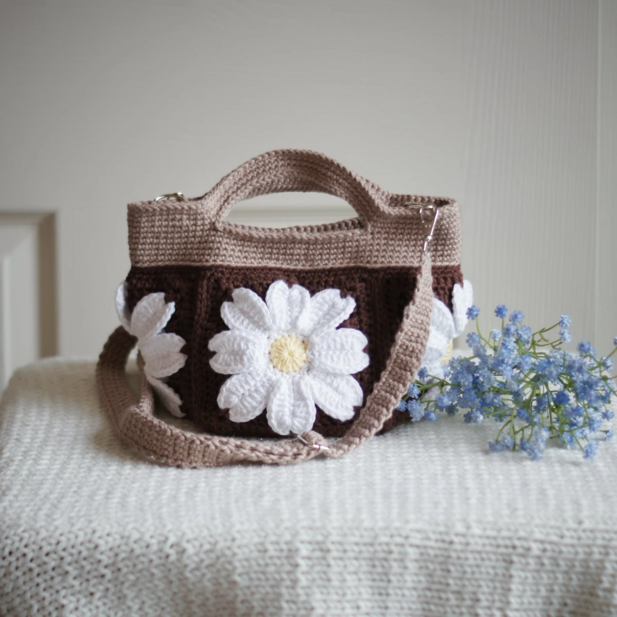crochet daisy bag in chocolate and khaki color formed with 3D daisy granny squares. Comes with adjustable strap.